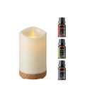 Candle Light Wood Diffuser with Essential Oil Set including Sweet Orange, Tea Tree, and Lavender oils on a white background.