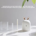 Deer humidifier accessories layout including the water tank, cotton strip, and main unit, with a free extra cotton strip included as a gift.