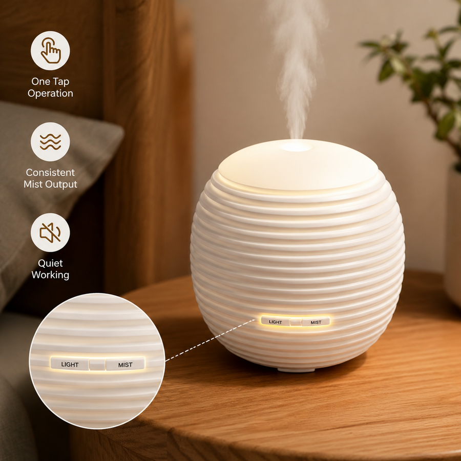 Close-up of the mini lantern diffuser controls highlighting One Tap Operation, Consistent Mist Output, and Quiet Working modes on a bedside table.