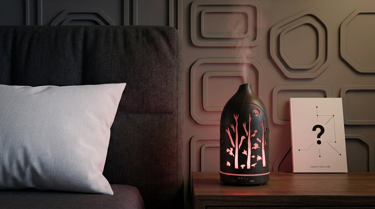 Dark wood forest aromatherapy diffuser emitting a calming red LED light on a nightstand in a modern bedroom with geometric wall panels.