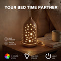 Light wood star diffuser as your bed time partner glowing with warm light on a nightstand, featuring 36dB noiseless operation, auto-off when waterless, and favorite color lock.