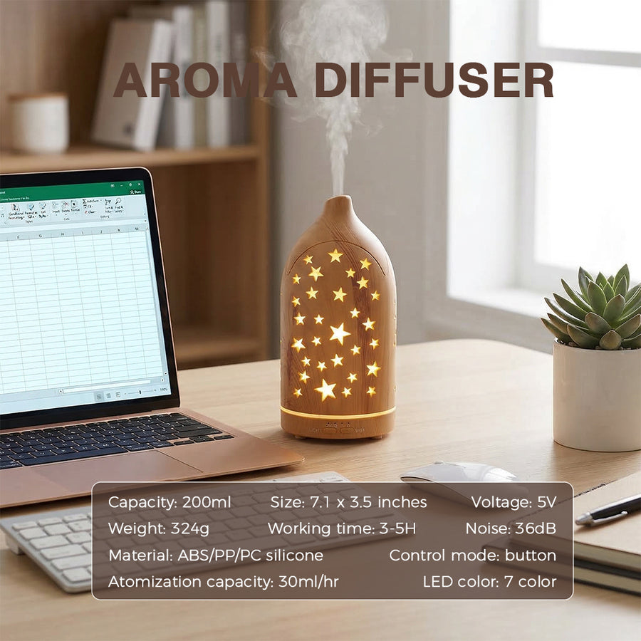Light wood star diffuser on a home office desk next to a laptop displaying a spreadsheet, showcasing product specifications: 200ml capacity, 36dB noise level, and 7 color LED lights.