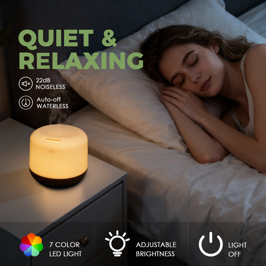 Pniaw 500ml diffuser operating at 22dB noiselessness on a nightstand next to a sleeping woman, featuring 7-color LED light with adjustable brightness.