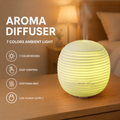 Aroma diffuser features infographic: 7 Color Ambient Moods, Easy Control, Soothing Mist, and USB Power Supply, shown with the device glowing yellow.