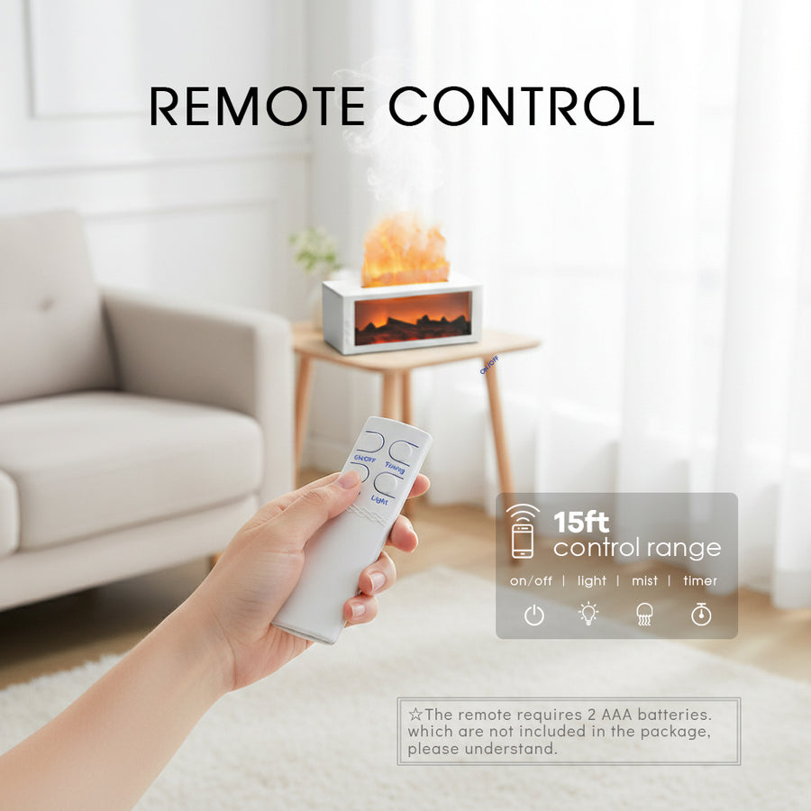 Hand holding the remote control for the white fireplace diffuser, showcasing 15ft wireless control range for on/off, light, mist, and timer settings.
