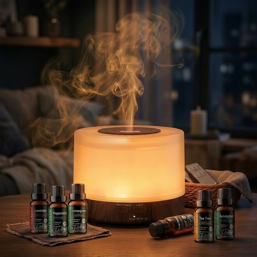 Pniaw dark wood grain round diffuser glowing with warm yellow light at night, surrounded by a 6-bottle essential oil set (Lavender, Peppermint, Lemongrass, etc.) and a wicker basket.